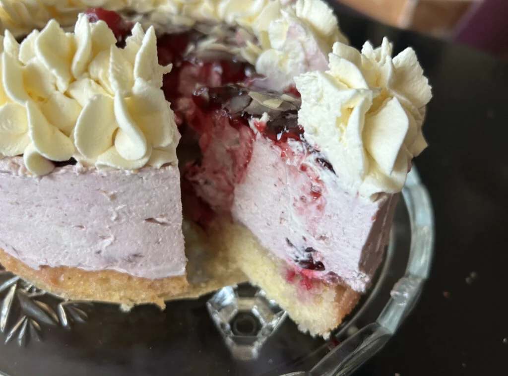 Cherry Bakewell Cheesecake with a sponge base
